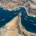 US charges Hormuz fees by...?